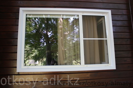 Пластиковые откосы с фассадной стороны.